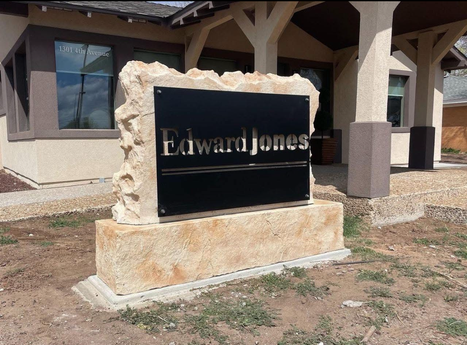 Custom crafted commercial Edward Jones boulder monument sign
