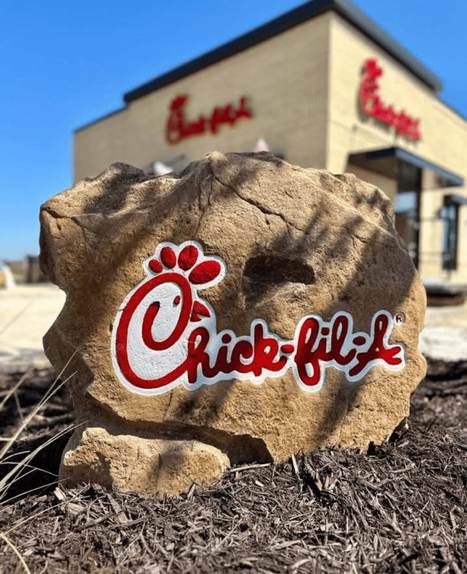 Custom crafted commercial Chick-fil-A boulder monument sign