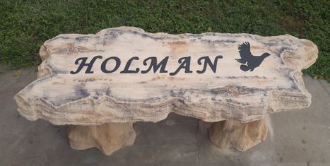 Custom engraved Holman boulder-style stone bench by Boulder Designs