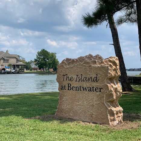 Custom carved stone commercial entrance sign for The Island at Bentwater waterfront community