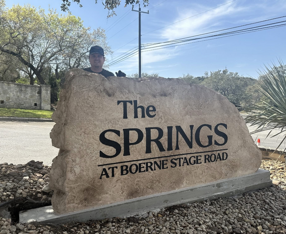 engraved entrance sign The Springs at Boerne Stage Road residential commercial monument