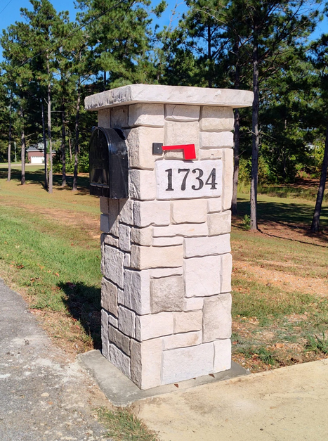 Custom crafted stone mailbox column with engraved address by Boulder Designs