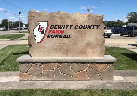 Custom engraved and etched stone commercial monument sign for DeWitt County Farm Bureau