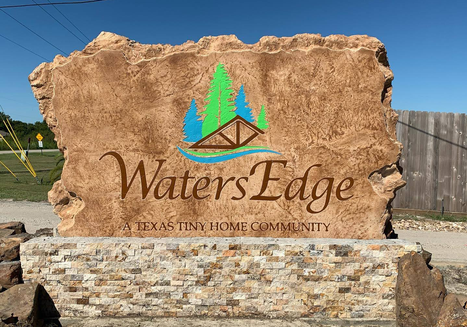 custom commercial boulder sign for Waters Edge tiny home community entrance