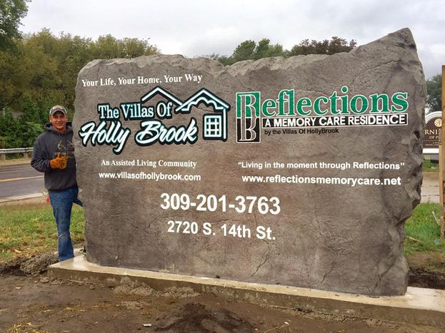 Custom carved stone commercial monument sign for Villas of Holly Brook and Reflections Memory Care residence