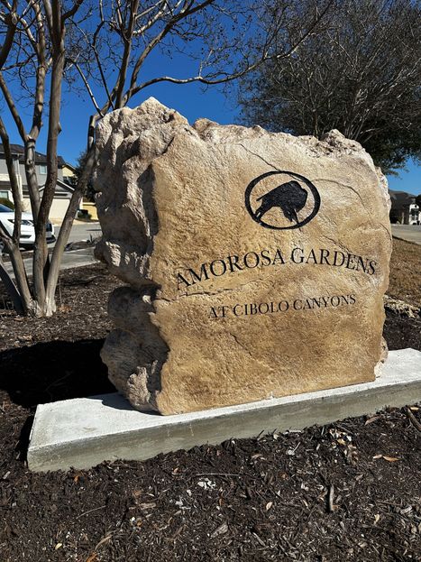 Custom Engraved Boulder Entrance Sign – Amorosa Gardens at Cibolo Canyons