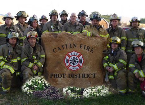 Custom crafted Catlin Fire Protection District commercial boulder monument sign