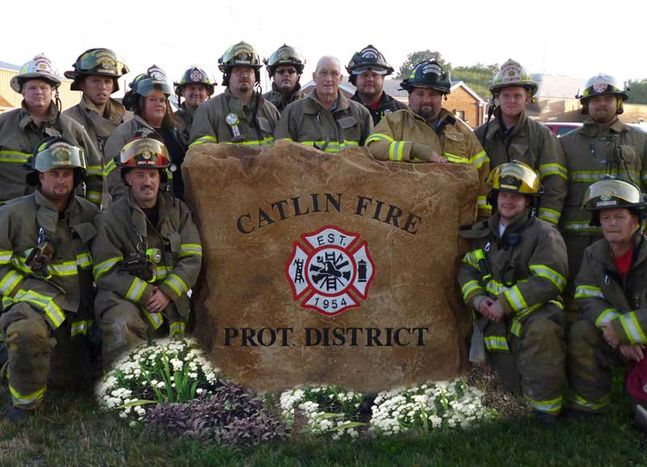 Custom crafted Catlin Fire Protection District commercial boulder monument sign