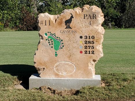 Custom engraved stone golf course hole marker boulder for Hole 11 Par 4 at Canyons at Blackjack Ridge