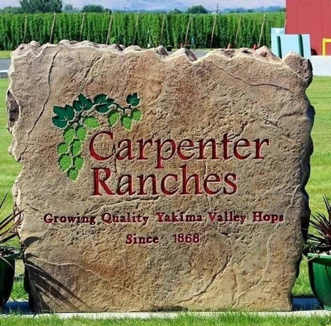 Custom carved stone commercial ranch entrance sign for Carpenter Ranches hop farm