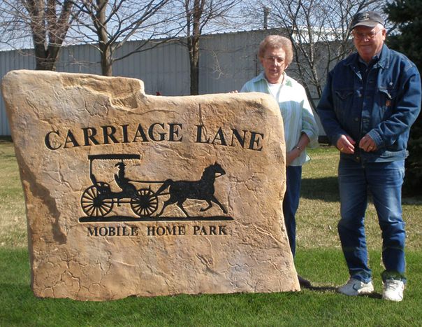 Handcrafted Engraved Stone Entrance Sign with Horse and Carriage Graphic for Residential Community