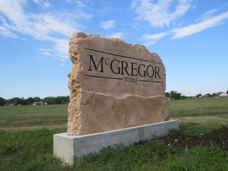 Custom engraved and etched stone commercial entrance sign for McGregor Texas