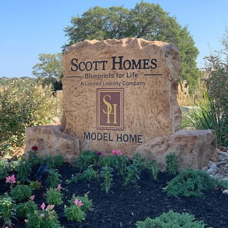 Custom crafted commercial Scott Homes engraved monument sign