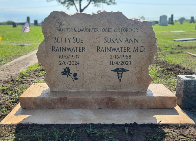 Affordable light tan stone boulder mother and daughter companion headstone