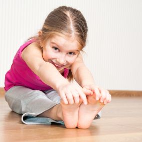 KIDS_bigstock-smiling-little-girl-in-pink-en-45173029_283x283.jpg