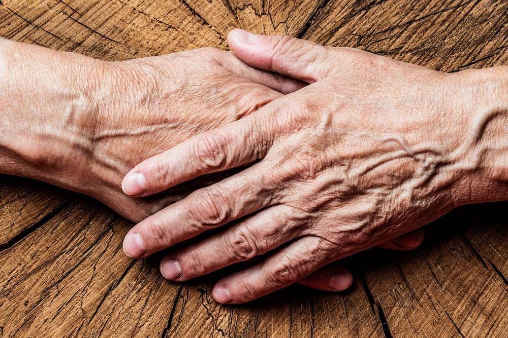 Elderly Hands Holding Eachother