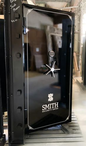 Gloss Black Elite Vault Door with silver handle and Smith Security Safes logo. Gloss Black Elite Vault Door with silver handle and Smith Security Safes logo.