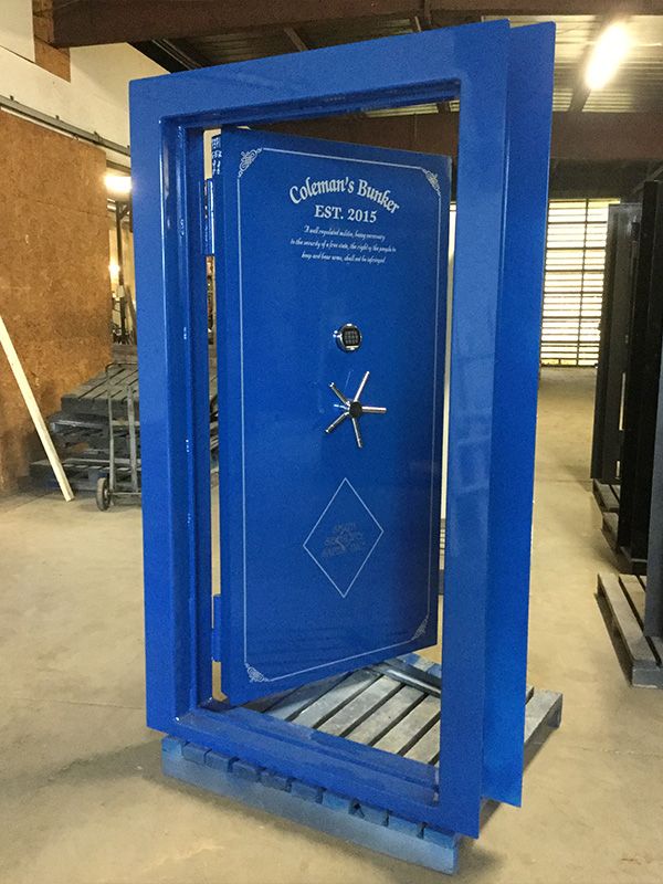 Gloss Blue Inswing Vault Door Silver Pinstripe and custom text on the outside of the door.