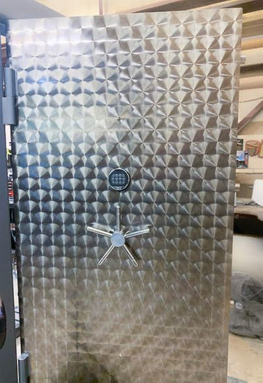 An opened Custom Engine Turn Finish Vault Door An opened Custom Engine Turn Finish Vault Door