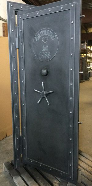 Custom Steampunk Vault Door with Top Circle Cutout and a heart. Custom Steampunk Vault Door with Top Circle Cutout and a heart.