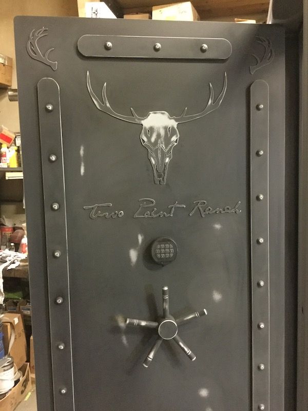 Two Point Ranch Custom Steampunk Vault Door with a deer skull engraving