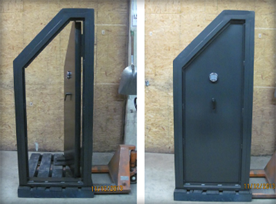 Uninstalled Slanted Custom Vault Door inside the Smith Security Safes warehouse