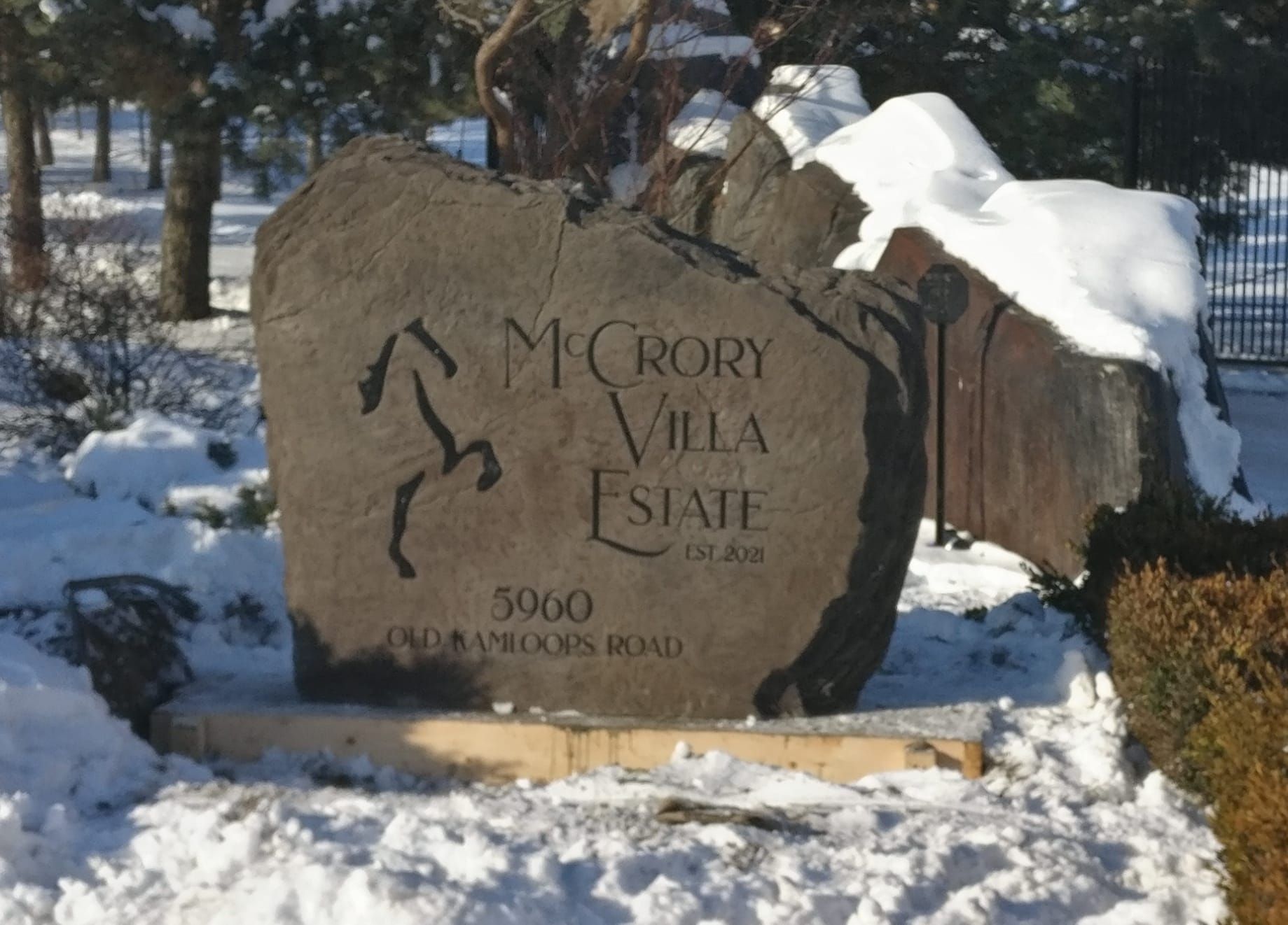 Rock entrance address and name signs