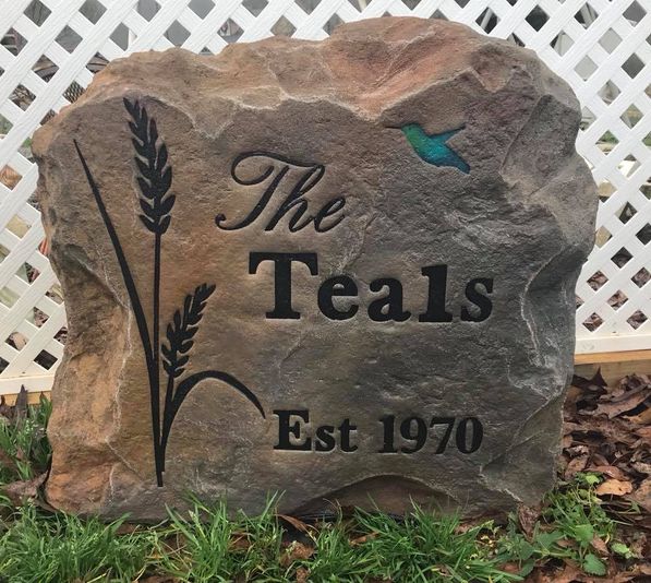 A beautiful family name rock for your garden! Garden boulder with family name and graphics