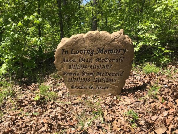 Personalized memorial stones placed in a private place
