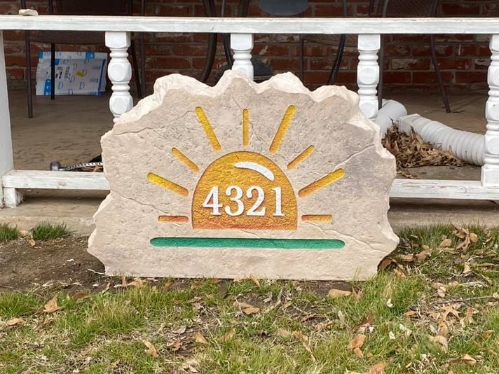 A gorgeous engraved sunrise address boulder