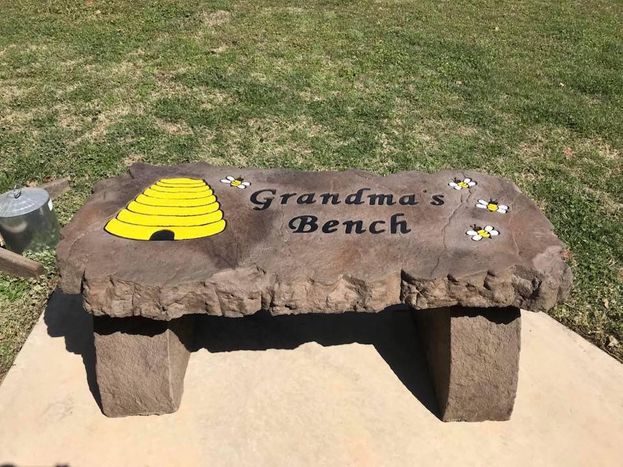 A stone garden bench personalized for you.