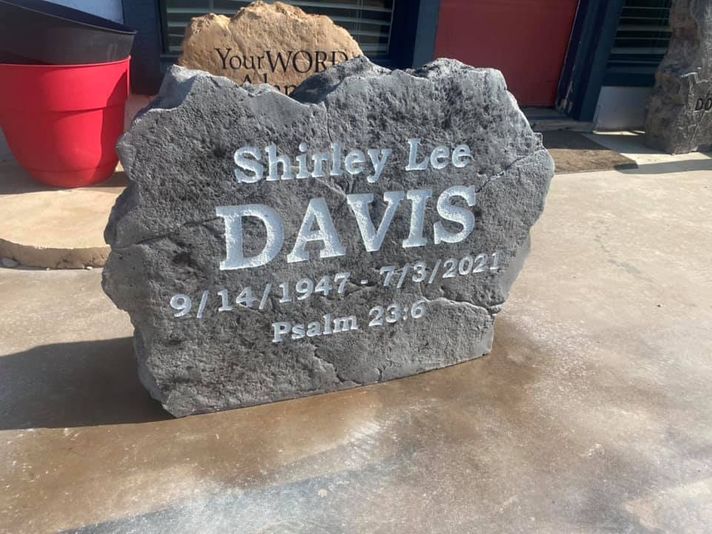 Place a memorial marker on your property to celebrate your loved one A small stone memorial marker to celebrate your loved one