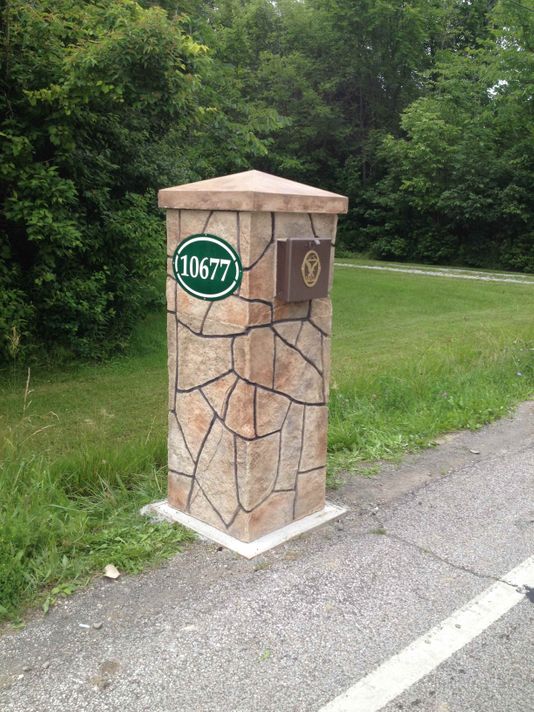 A solid pillar for your mailbox and house number Mailbox and address pillar