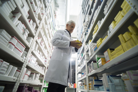 Pharmacist Reading Medication Label