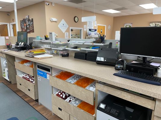 Behind the counter at Advanced Scripts Compounding Pharmacy