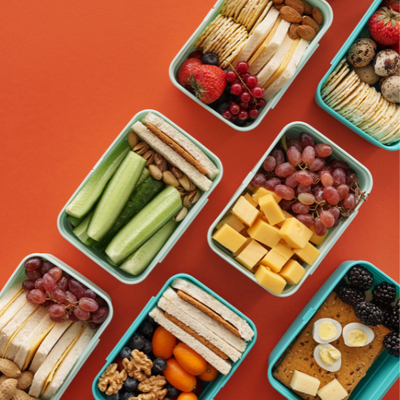 lunch box lunches with fruit veggies and cheese
