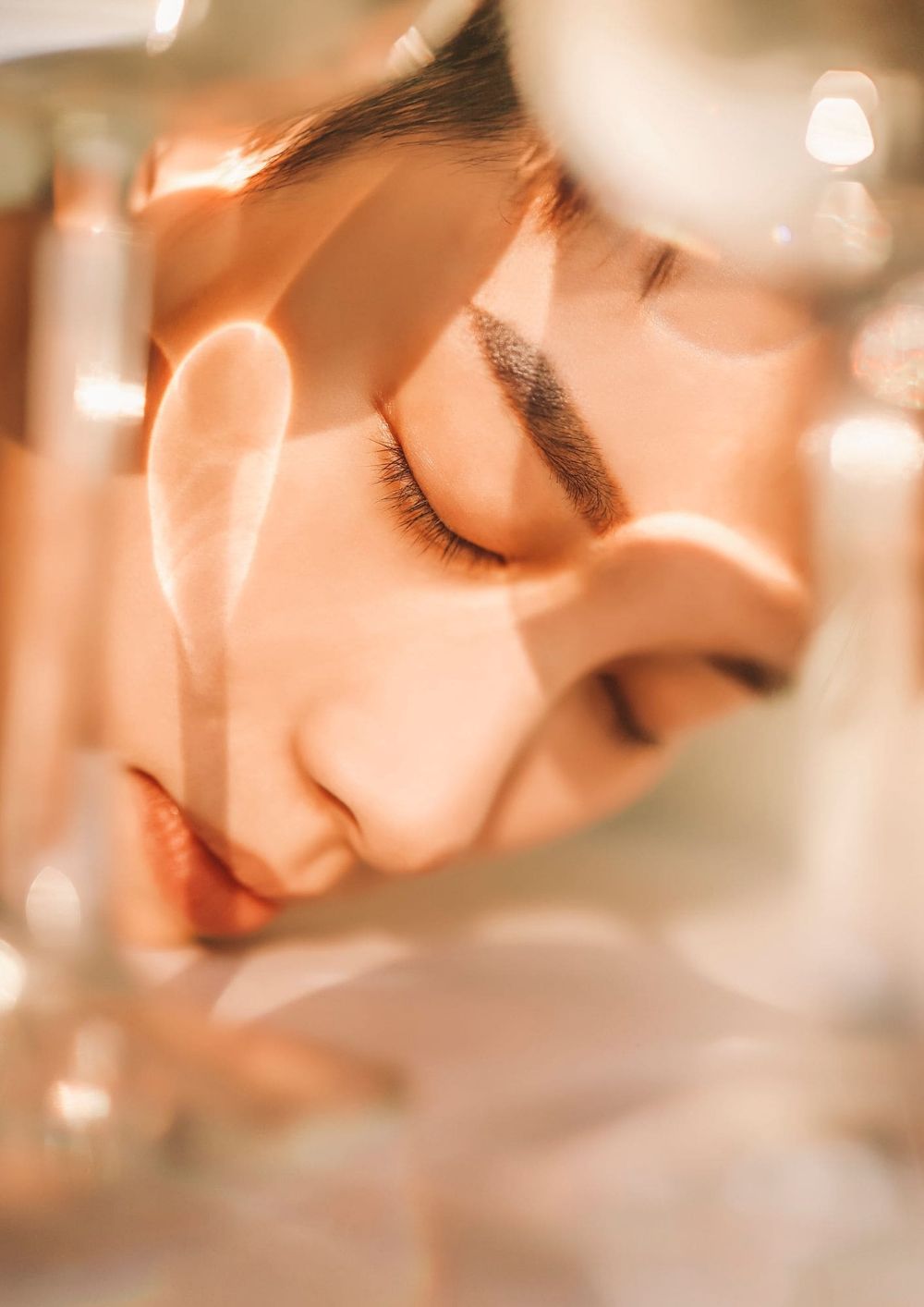 A woman with eyes closed while relaxing