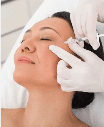 A woman receiving an injectable