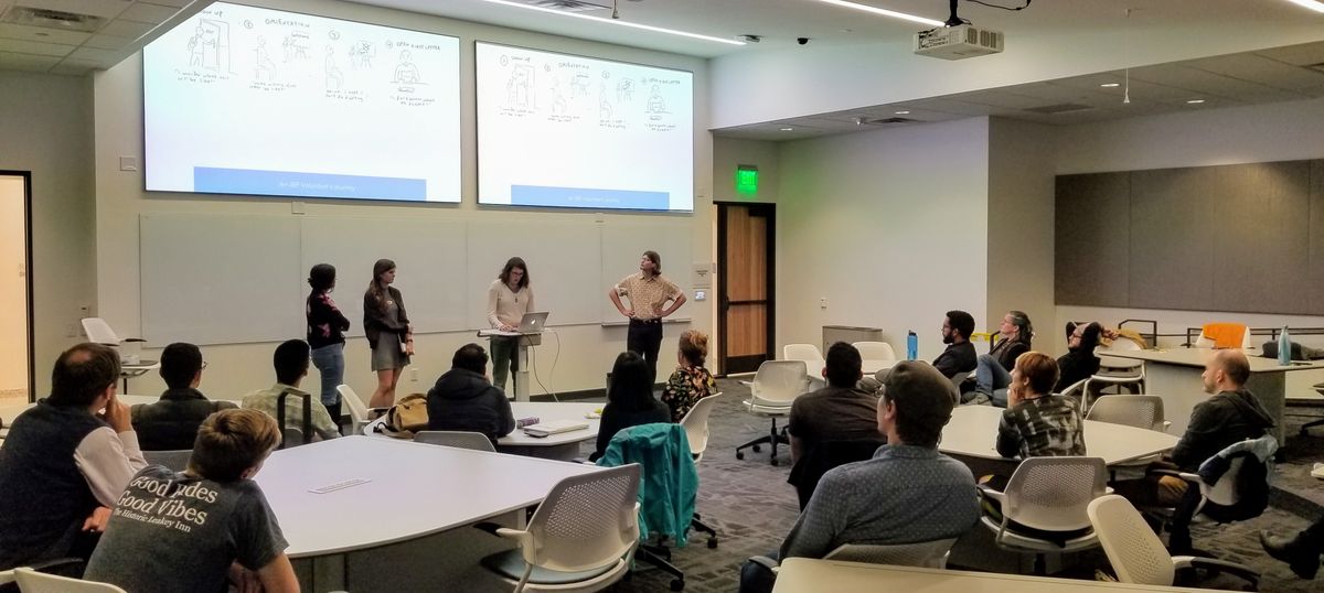 Design-a-thon 2018 Champions - THinK - Presenting in front of room Design-a-thon 2018 Champions - THinK - Presenting.jpg