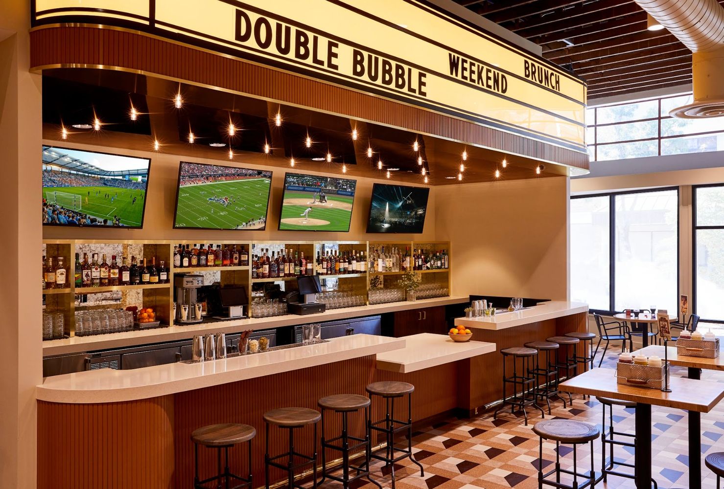 Bar seating to watch live sports games at Mainzer Merced | Restaurant, Music Venue, and Movie Theater Bar Seating at Mainzer Merced | Restaurant, Music Venue, and Movie Theater
