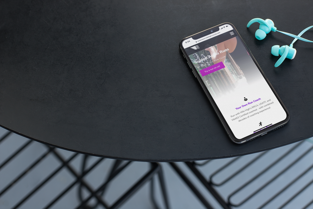 mockup-for-a-podcast-featuring-an-iphone-xs-max-next-to-a-pair-of-blue-earphones-24721.png