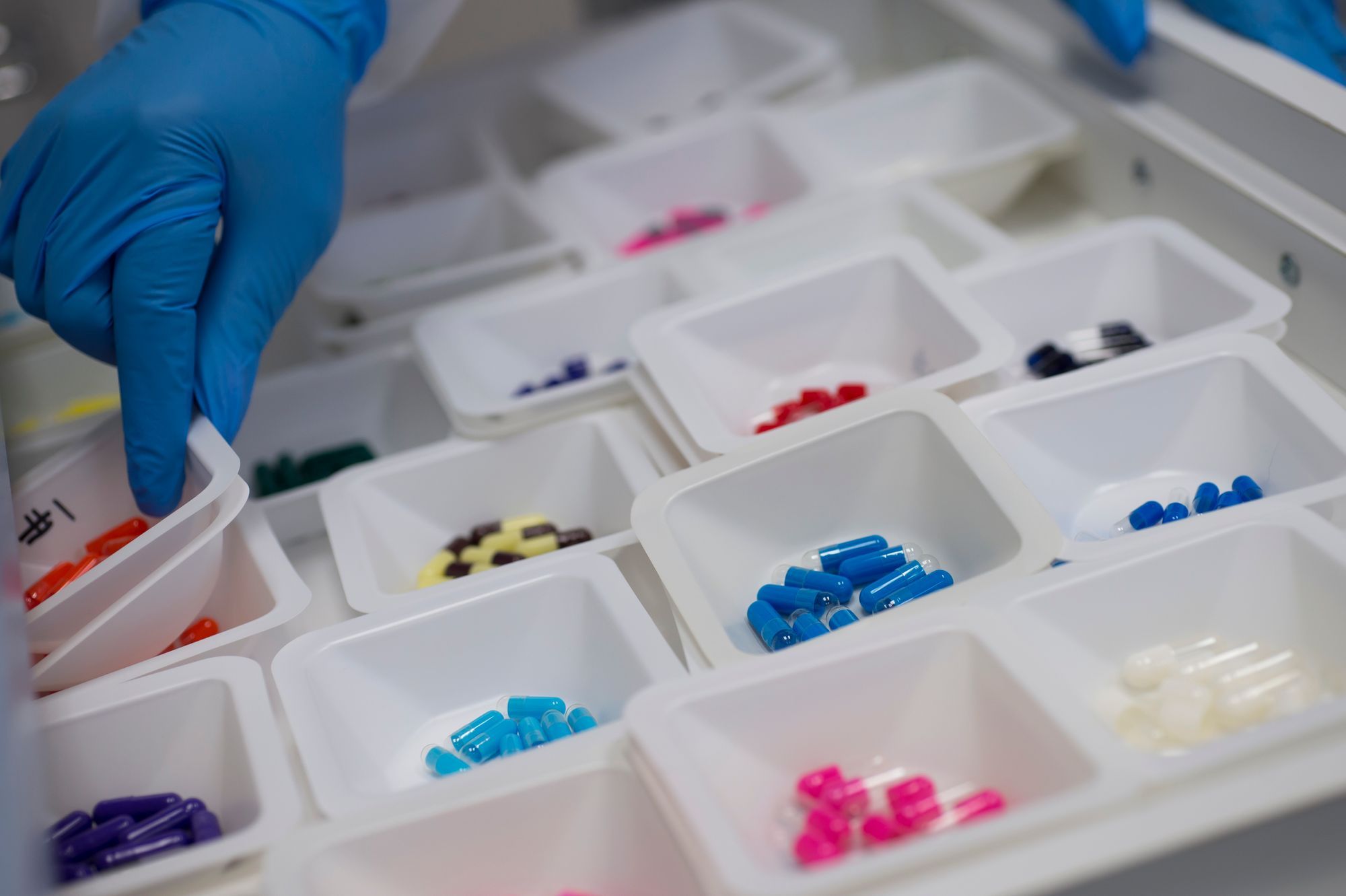 Pharmacist handling medications