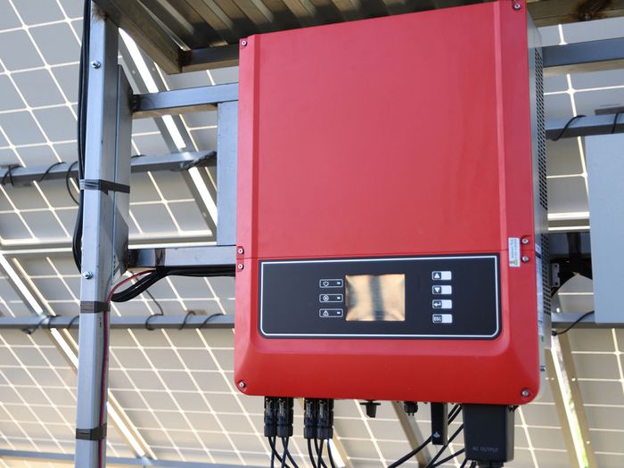 Image of a solar storage battery beneath panels
