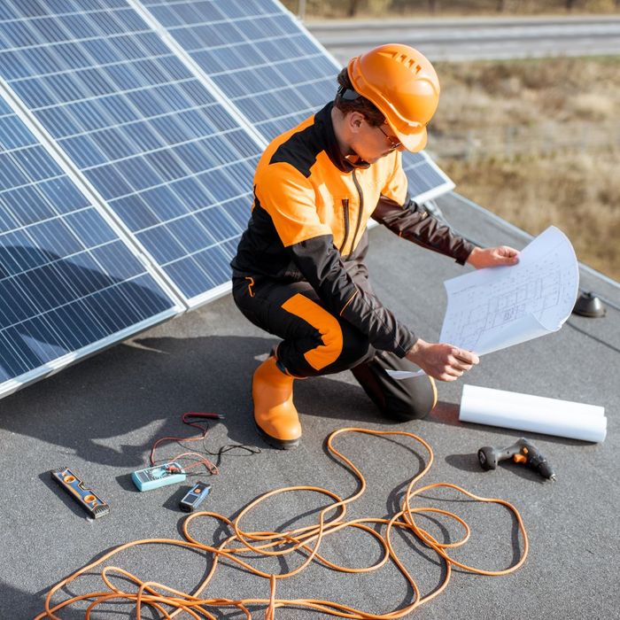 a professional installing solar panels