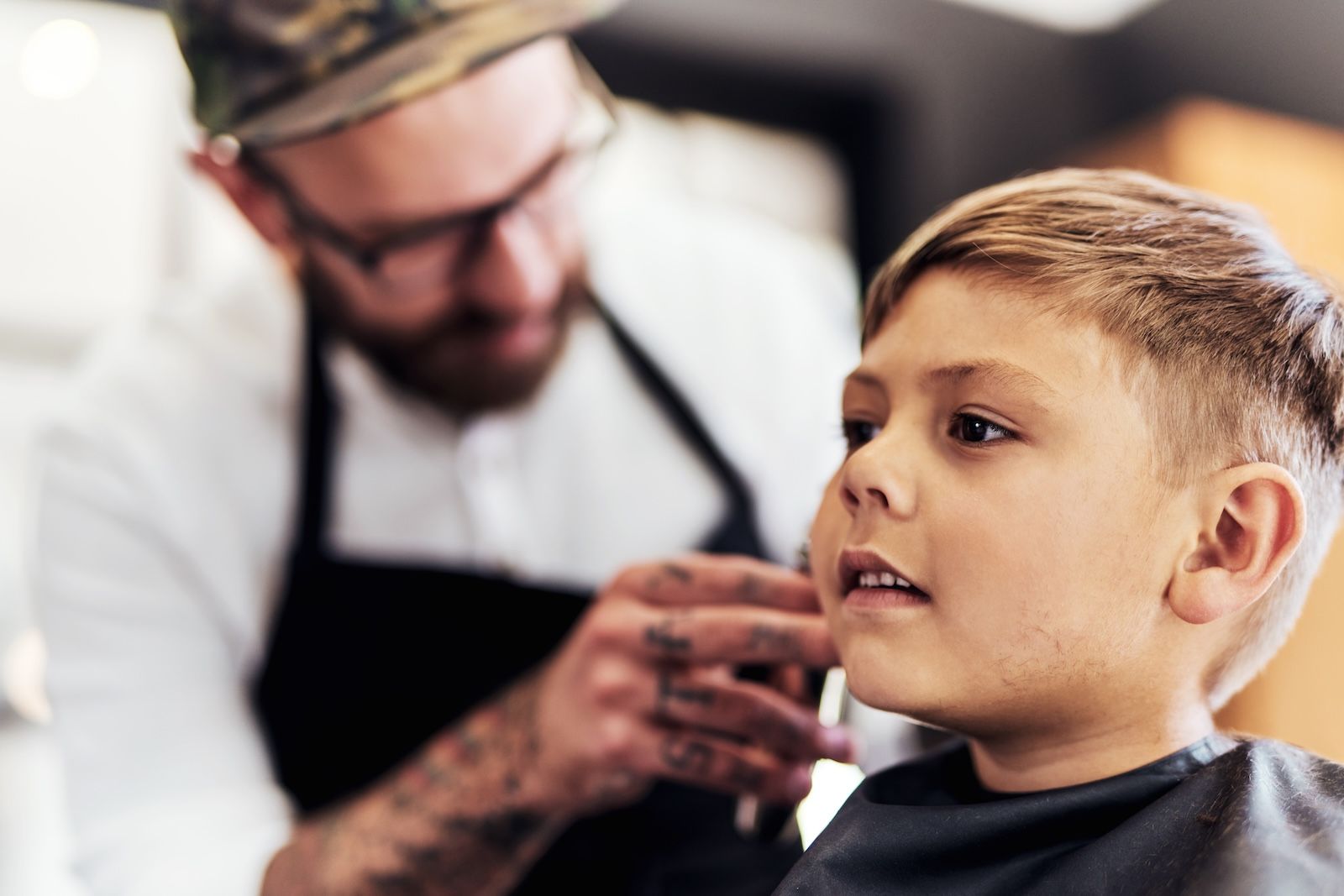 child-client-trim-barber-barbershop-with-clippers-cutting-makeover-grooming-service-boutique-customer-hairstylist-haircut-hair-care-hairdresser-treatment-salon.jpg