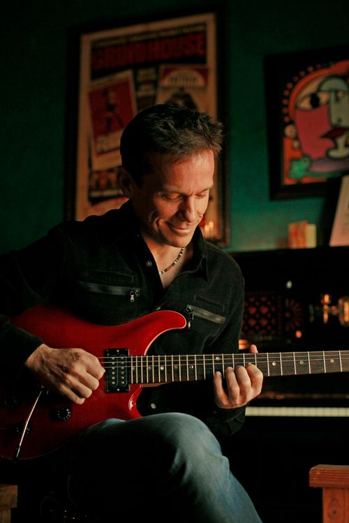 carl_on_guitar_2 750.jpg
