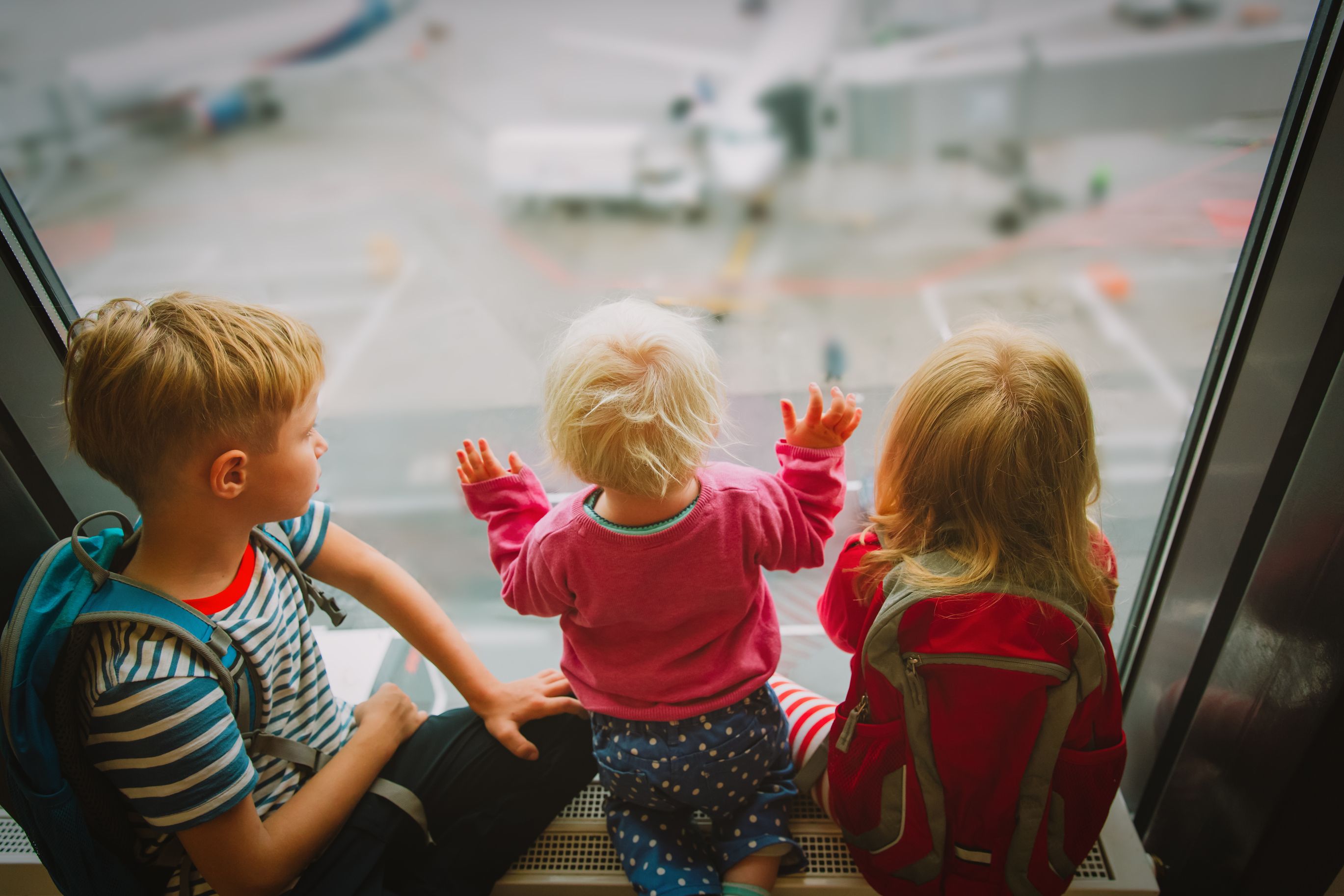 Family at an airport Travel Vaccinations