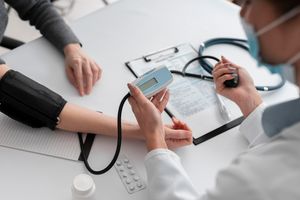 doctor-checking-medical-condition-patient.jpg