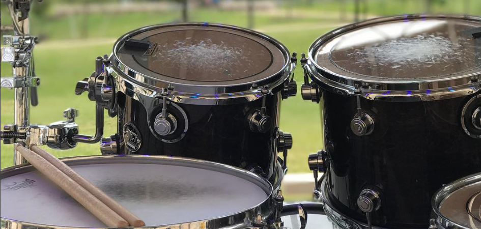 A drum kit at an outdoor concert