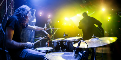 Drummer playing at a concert